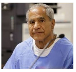 Sirhan in a prison jumpsuit